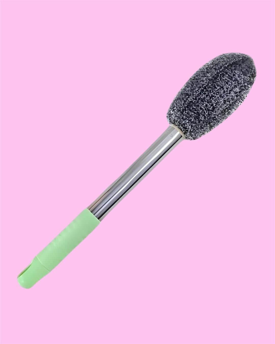 Bottle jar toilet cleaner brush scrubber with a green handle, made of plastic and steel for effective cleaning.